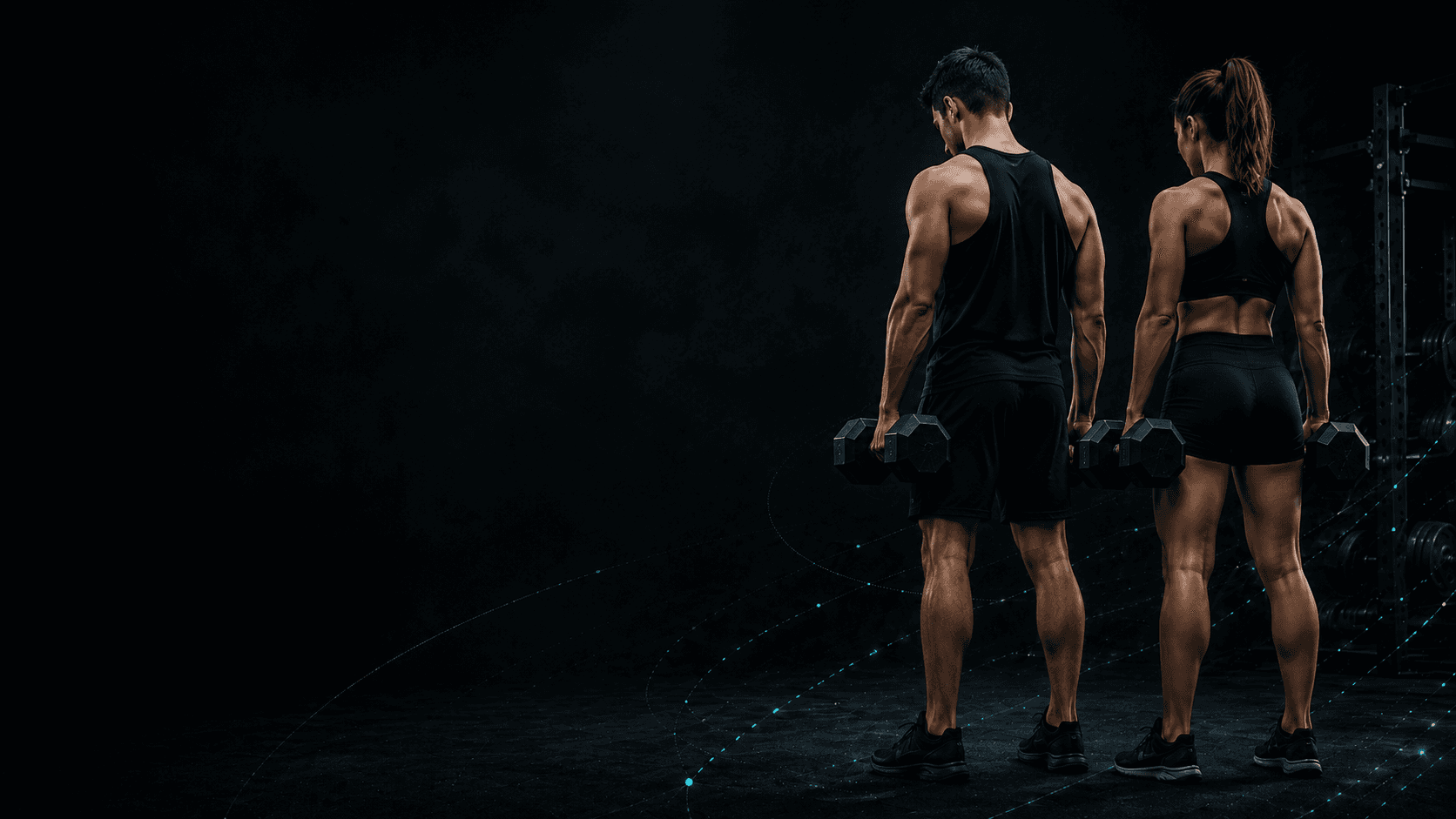 Two athletes sprinting forward together in a dark gym